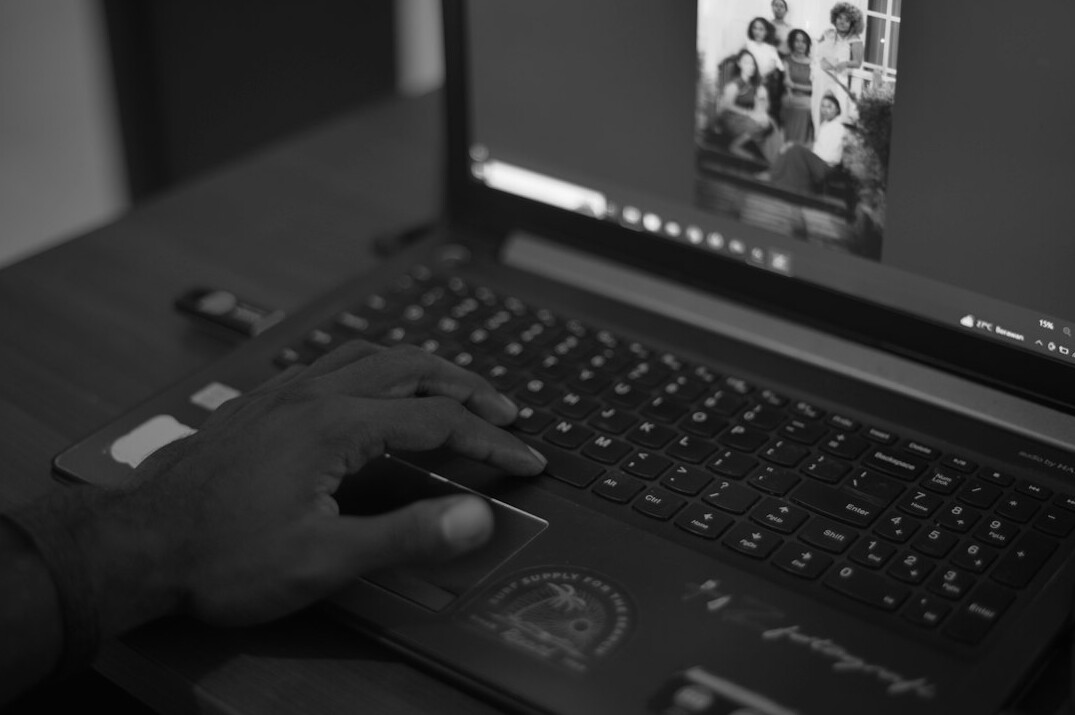 video editor working on laptop