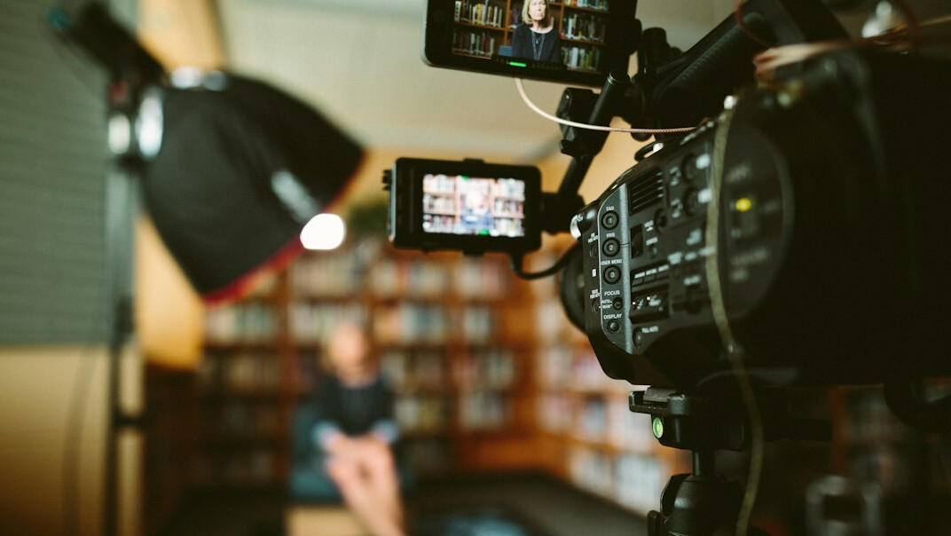 filmmaker reviewing footage