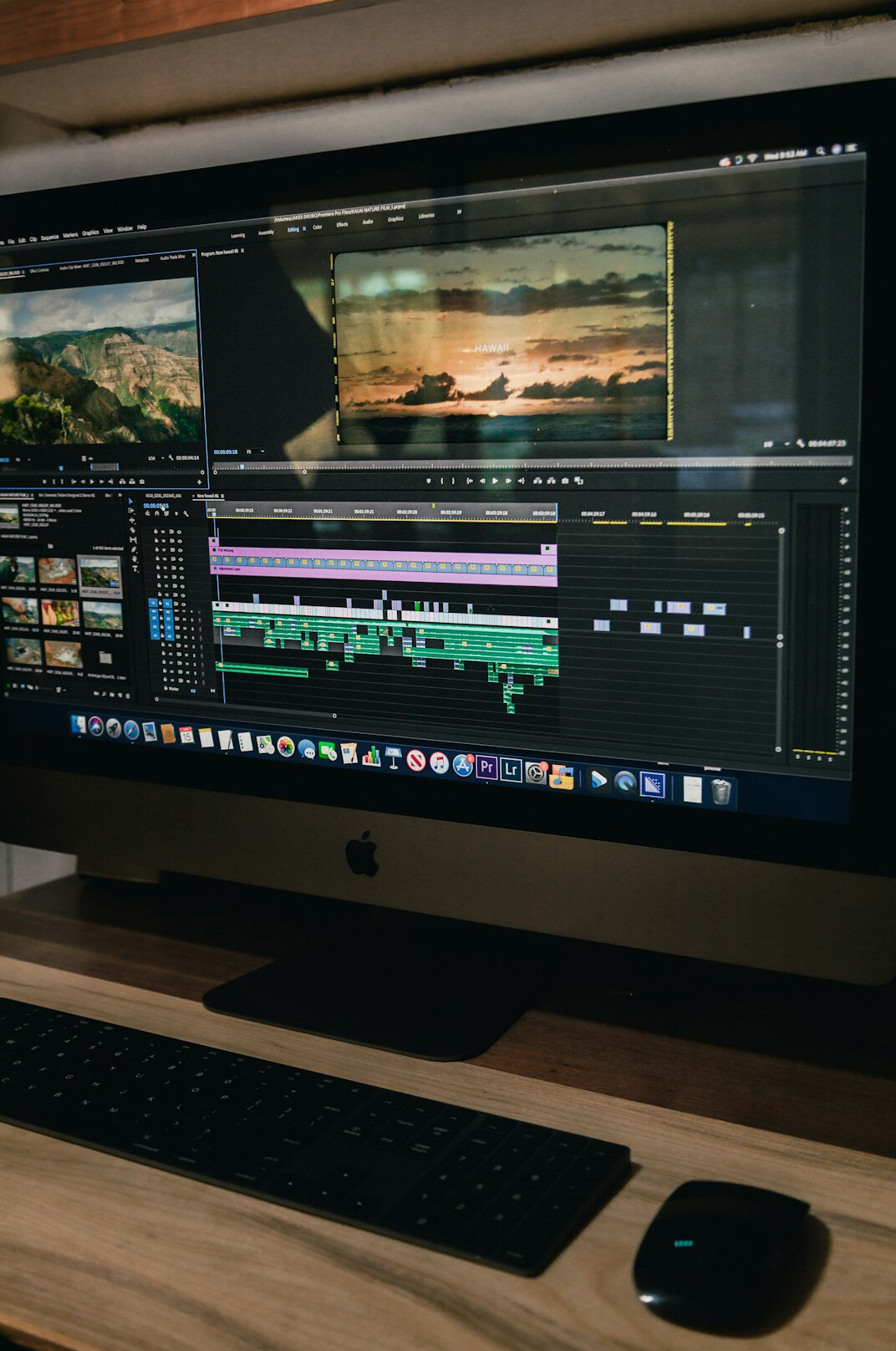 video editor working at desk