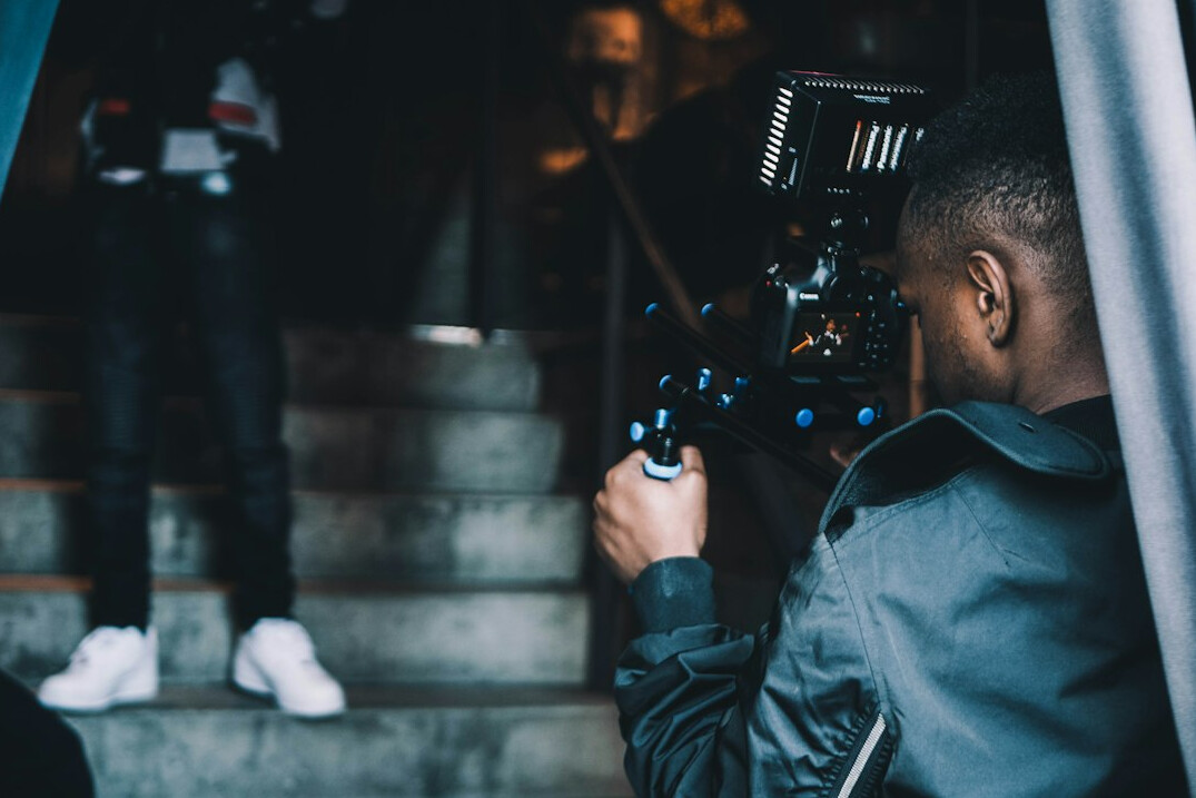 cinematographer filming scene
